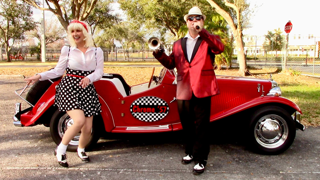 Interactive entertainment, Mount Dora, Florida. 50s band, Oldies band, Oldies duo, Sock hop, Show band on Wheels, Grease theme entertainment, antique car, hot rod, live band, rockabilly. Grease theme party entertainment, Muscle car, atmosphere entertainment, Mount Dora, Florida, DJ on Wheels
